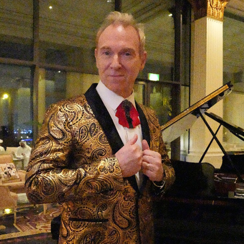 Wim Hoste Wearing Golden Suit